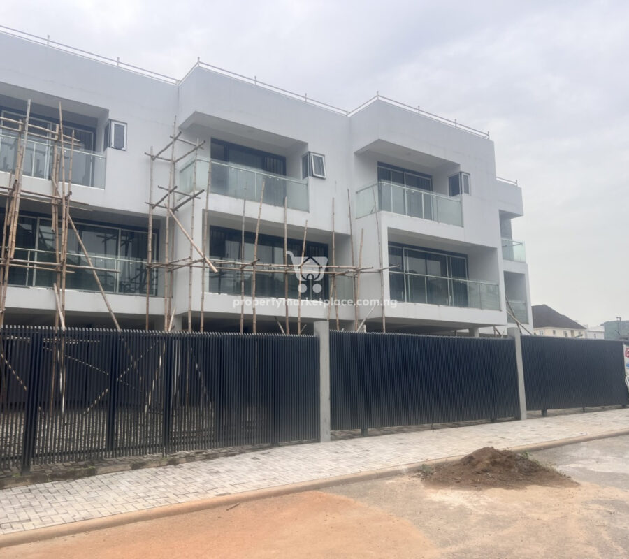 4 bedroom terrace duplex with a room boys quarters and open rooftop