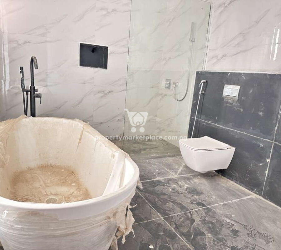 Superbly built 4 bedroom terrace duplex with Bq