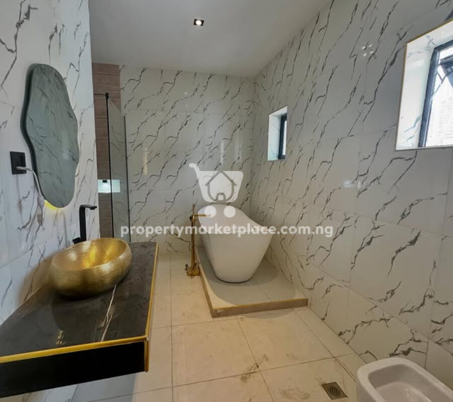 4 bedroom semi-detached duplex with a private compound