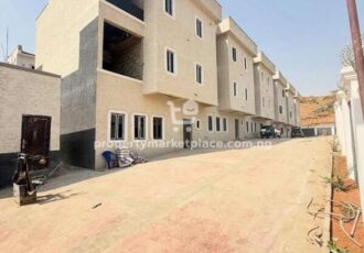 Solidly built 4 bedroom terrace duplex with a room Bq