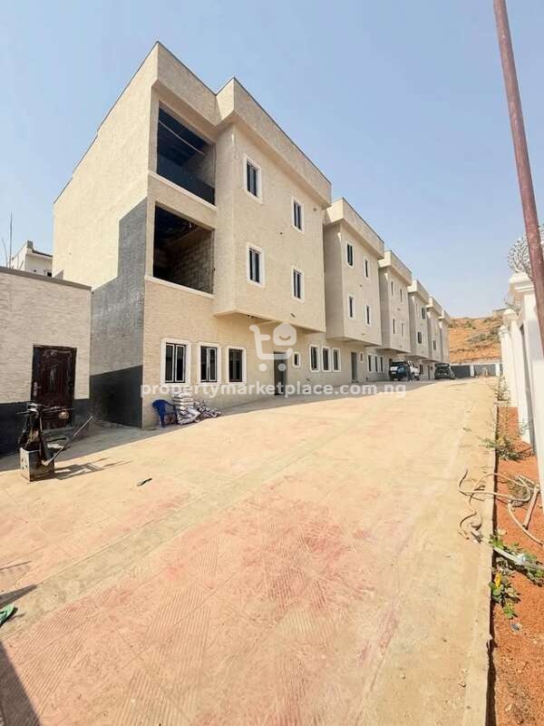 Solidly built 4 bedroom terrace duplex with a room Bq